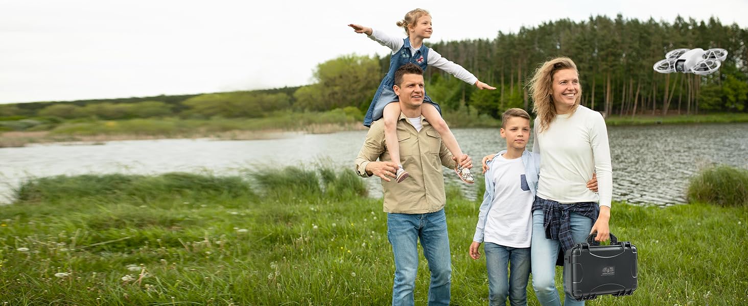 family out on a trip near a river 